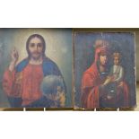 Two 19th century Russian oil on panel icons, 31 x 26cm and 27 x 22cm, unframed