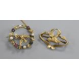 An Art Nouveau 15ct gold bird brooch and one other yellow metal and gem set bird brooch, 27mm et