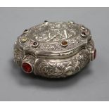 A 19th century German? embossed white metal and multi stone set snuff box and cover, 85mm.