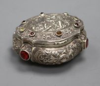 A 19th century German? embossed white metal and multi stone set snuff box and cover, 85mm.