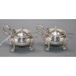 A matched pair of silver mustard pots by Goldsmiths & Silversmiths Ltd(1) and Charles & Richard