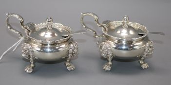 A matched pair of silver mustard pots by Goldsmiths & Silversmiths Ltd(1) and Charles & Richard