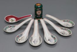 A set of seven spoons and toothpick holder