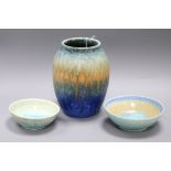 A Ruskin green, orange and blue-glazed crystalline vase and two crystalline turquoise bowls (3) vase