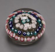 A 19th century French spaced concentric millefiori glass paperweight
