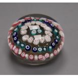 A 19th century French spaced concentric millefiori glass paperweight