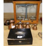 An Edwardian writing box, four copper measures and Scientific scales and weights