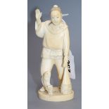 A Japanese ivory okimono of a fisherman