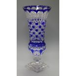 A large blue overlaid cut glass vase height 41cm