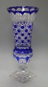 A large blue overlaid cut glass vase height 41cm