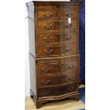 A walnut serpentine chest on chest W.72cm