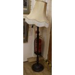 A turned and fluted lamp standard and shade Width of base 35cm