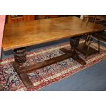 A 17th century style oak refectory table W.183cm