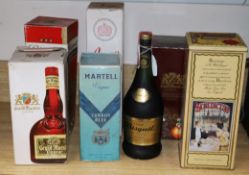 Seven bottles including Cognac, Grand Marnier, Benedictine, etc.