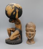 A carved wood figure of Atlas and one other carving tallest 42cm