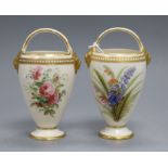 A pair of Worcester flower painted basket handled vases