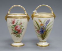 A pair of Worcester flower painted basket handled vases