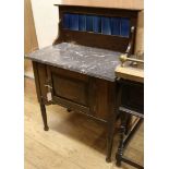 A late Victorian oak, marble topped washstand W.76cm