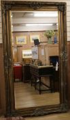 A large Victorian style wall mirror W.125cm