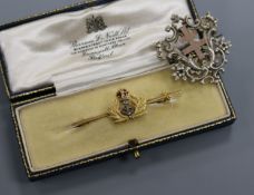 A 9ct gold and enamel naval sweethearts bar brooch, and a late 19th century French? white and yellow