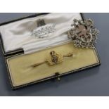 A 9ct gold and enamel naval sweethearts bar brooch, and a late 19th century French? white and yellow