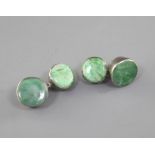 A pair of Chinese jadeite and silver mounted cuff links, late 19th/early 20th century, with chain