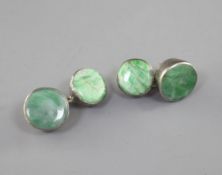 A pair of Chinese jadeite and silver mounted cuff links, late 19th/early 20th century, with chain