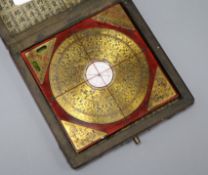A cased Chinese compass