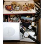 A collection of mixed costume jewellery and assorted watches.