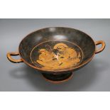 After the antique. A classic red figure Kylix 500BC copy hand painted by Nic Gabriel, length 35.5cm