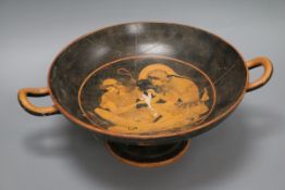 After the antique. A classic red figure Kylix 500BC copy hand painted by Nic Gabriel, length 35.5cm