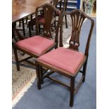 A set of eight George III style mahogany dining chairs