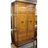 A satinwood armoire W.132cm