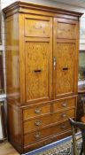 A satinwood armoire W.132cm