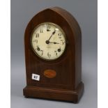 An Edwardian shell inlaid mantel clock