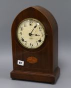 An Edwardian shell inlaid mantel clock