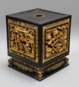 A late 19th/early 20th century Chinese giltwood and black lacquer incense stand