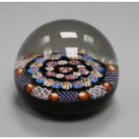 A Paul Ysart spaced concentric millefiori glass paperweight