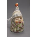 A Royal Worcester candle extinguisher of a man in a bed cap