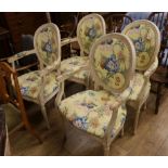 A set of four painted salon chairs
