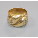 A George V 18ct gold and diamond set twin serpent ring, size P.