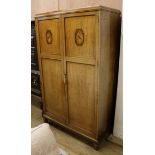 An Art Deco walnut and marquetry wardrobe, probably by Bath Cabinet Makers W.107cm