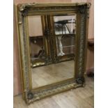A large Victorian style gilt wall mirror W.105cm