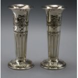 A pair of late Victorian repousse silver spill vases, by Atkin Brothers, Sheffield, 1892, 15.4cm,