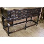 A Jacobean style oak dresser base W.137cm