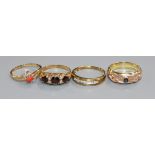 A Victorian style 9ct gold, garnet and diamond half-hoop ring and three other gem-set 9ct gold