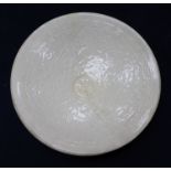 A Chinese pottery cream dish