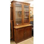 A late 19th century mahogany bookcase cupboard W.123cm