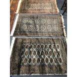 Three Pakistan Bokhara rugs 150 x 95cm, 155 x 95cm and 155 x 95cm