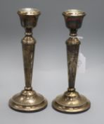 A modern pair of silver candlesticks, A.T. Cannon Ltd, Birmingham, 1972, weighted, 23.2cm.